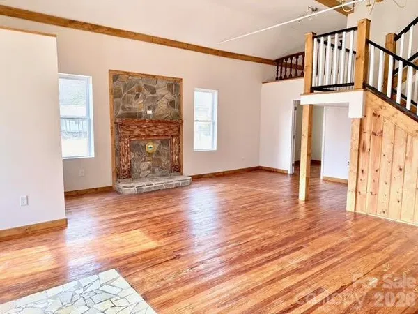 a view of entryway with wooden floor