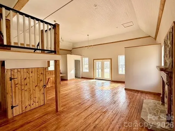 a view of a entryway with wooden floor