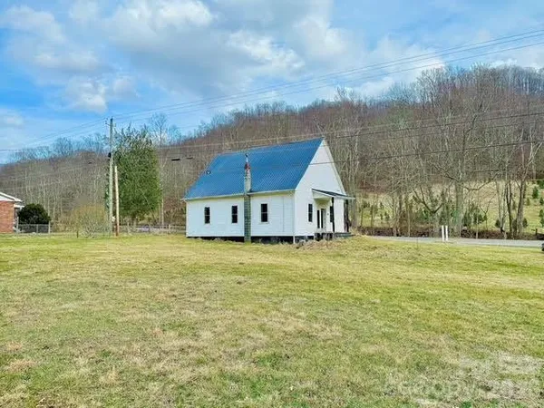 a house with yard in front of it