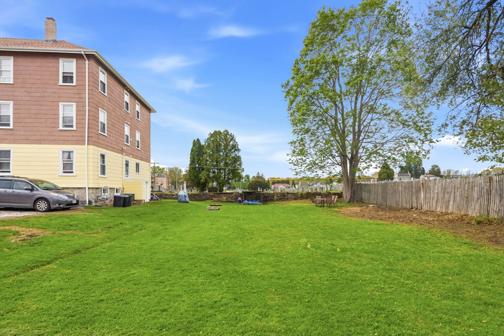 612 Rathbun Street Blackstone, MA 01504 - Photo 11 of 41 a view of a house with a yard