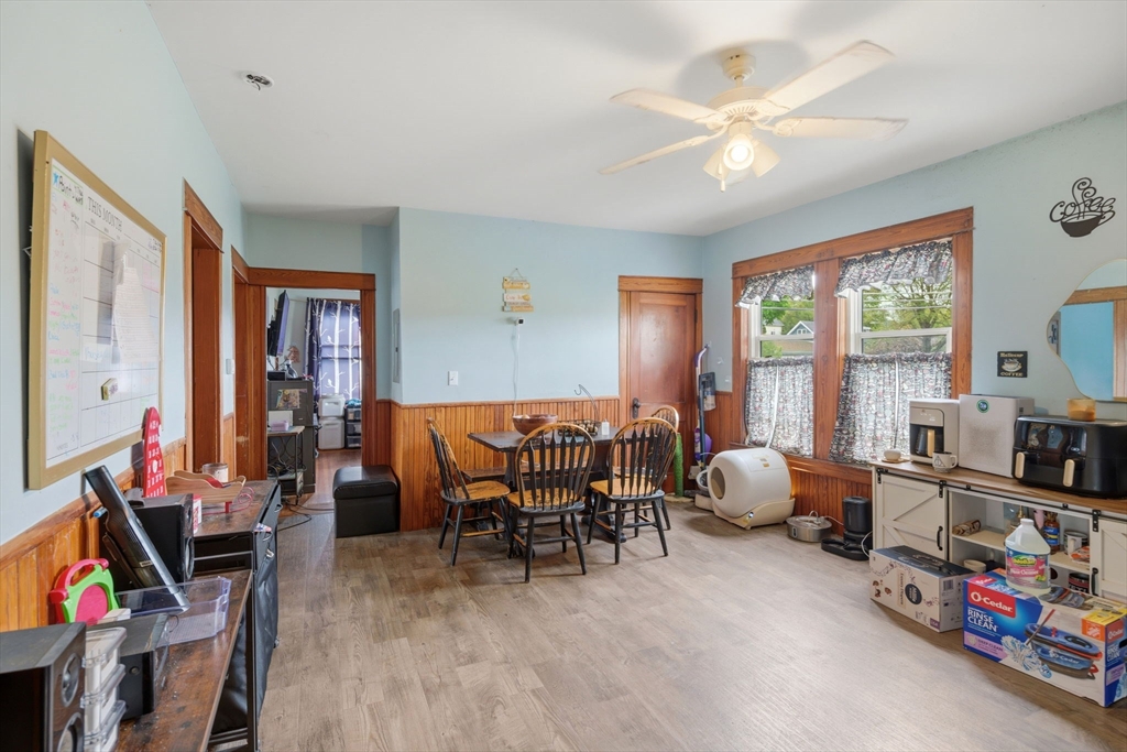 612 Rathbun Street Blackstone, MA 01504 - Photo 15 of 41 a living room with furniture and a large window