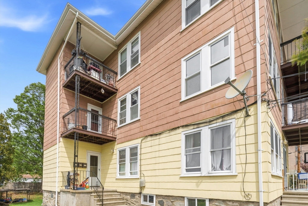 612 Rathbun Street Blackstone, MA 01504 - Photo 2 of 41 a view of a building with a street
