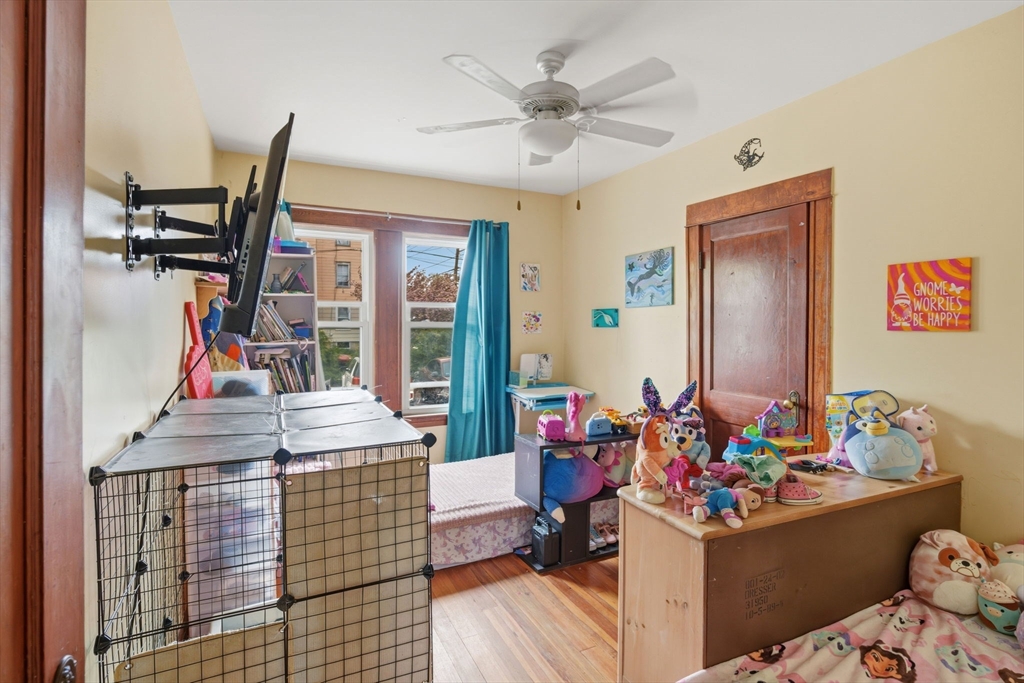 612 Rathbun Street Blackstone, MA 01504 - Photo 22 of 41 a living room with furniture and a wooden floor