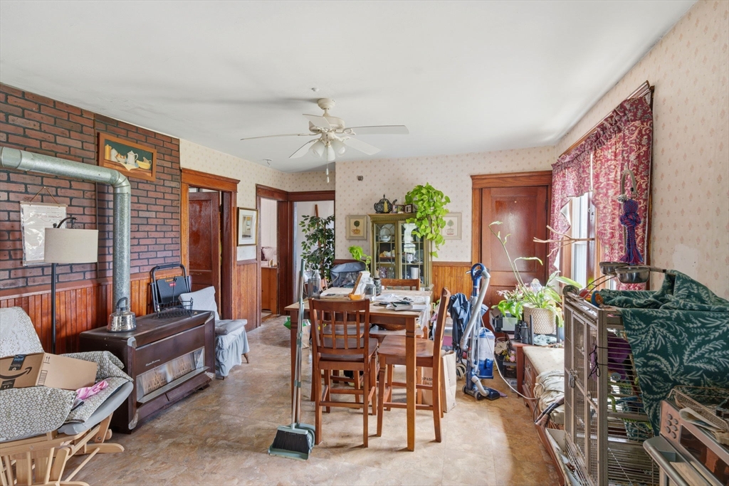 612 Rathbun Street Blackstone, MA 01504 - Photo 30 of 41 a view of a dining room with furniture window and outside view