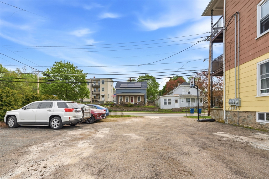 612 Rathbun Street Blackstone, MA 01504 - Photo 10 of 41 a cars parked in front of a house