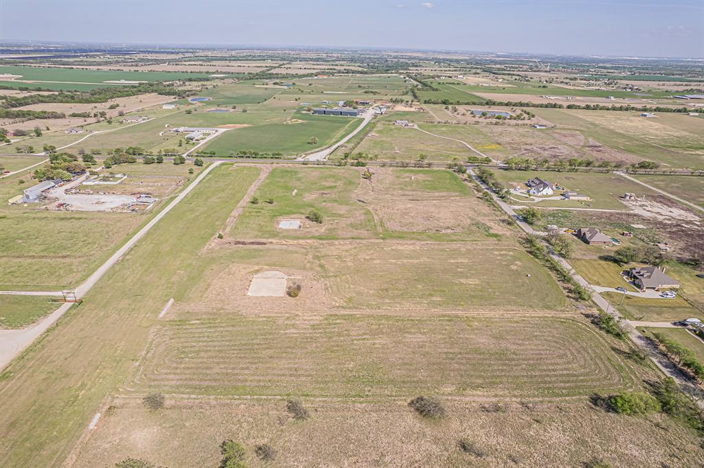 12588 Flow Krum, TX 76249 - Photo 17 of 21 Aerial view of property's location with rural landscape and large plots for crops