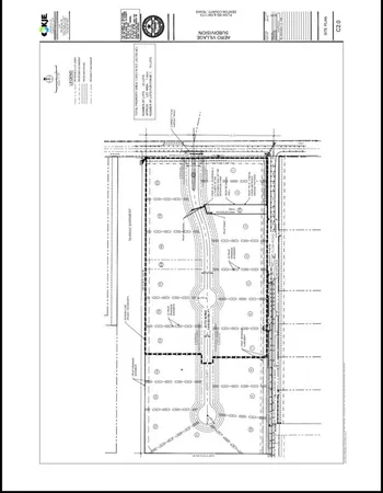 a picture of a bathroom with a shower