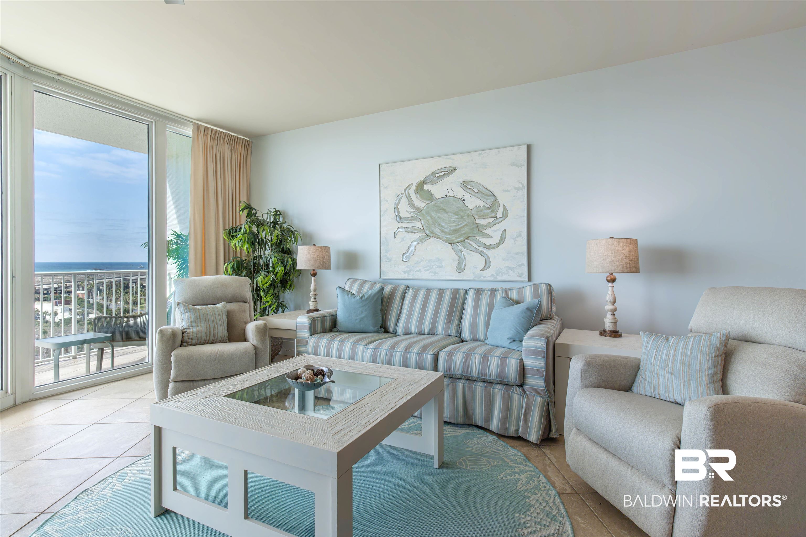 28107 Perdido Beach Boulevard, Unit D714 Orange Beach, AL 36561 - Photo 2 of 88 Living area with light tile patterned flooring and floor to ceiling windows