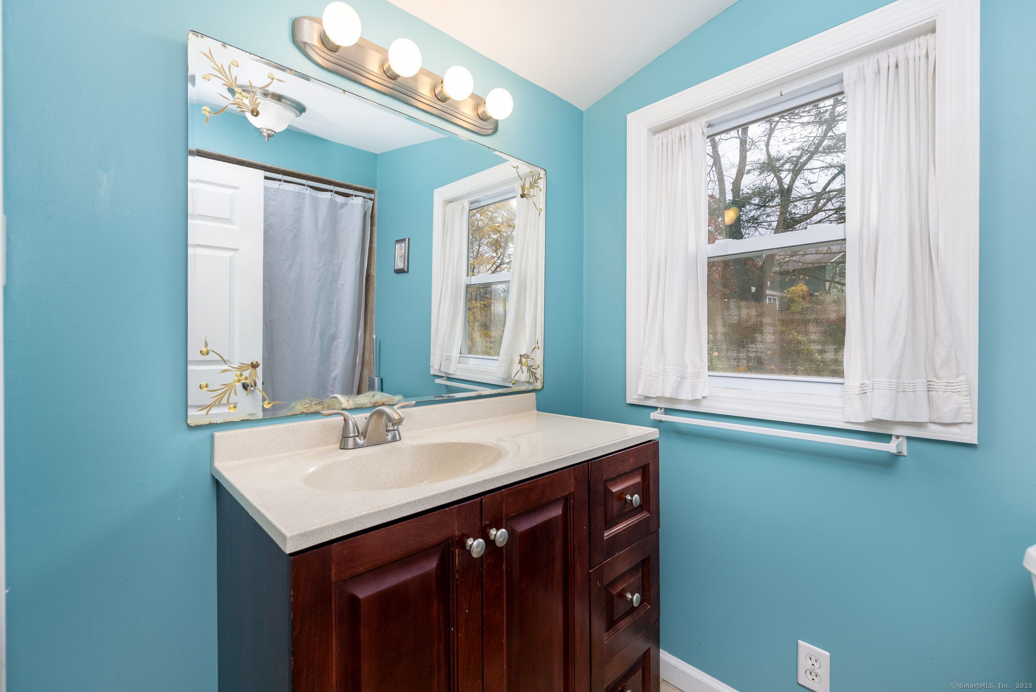 30 Lakeview Drive Bethlehem, CT 06751 - Photo 20 of 27 a bathroom with a sink and a mirror