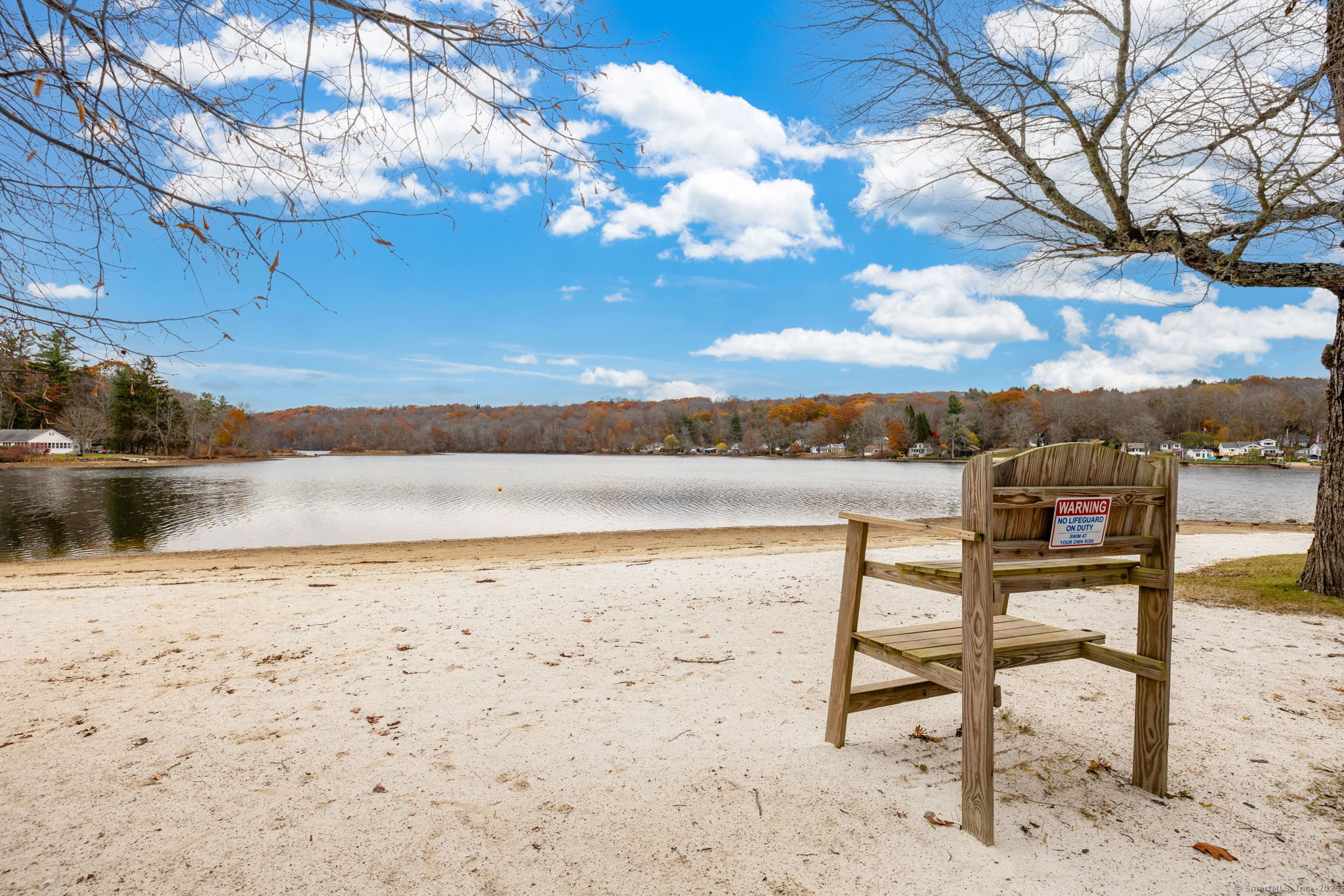 30 Lakeview Drive Bethlehem, CT 06751 - Photo 24 of 27 a view of a lake with a table and chairs