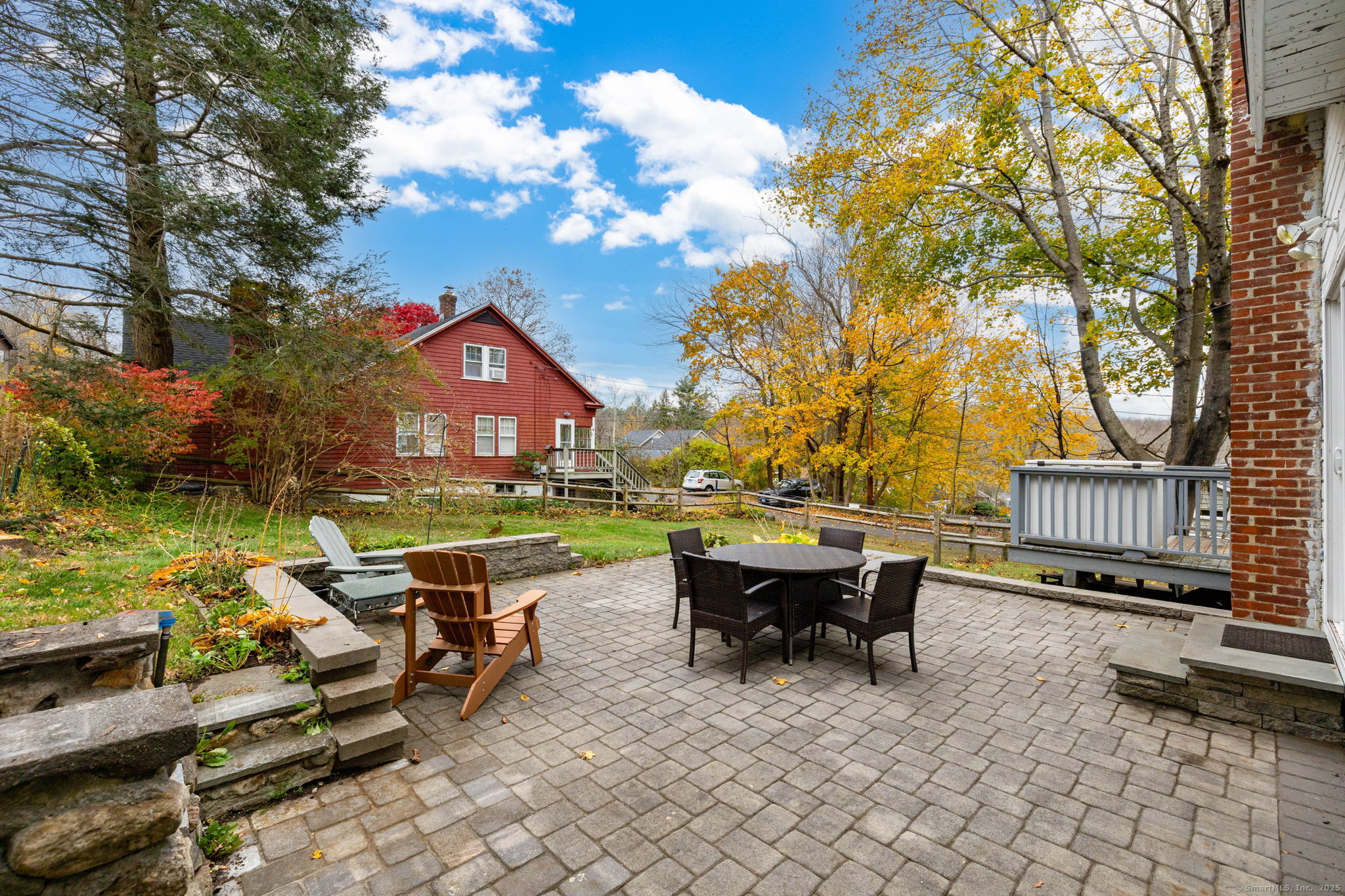 30 Lakeview Drive Bethlehem, CT 06751 - Photo 5 of 27 a view of a patio with table and chairs and wooden fence