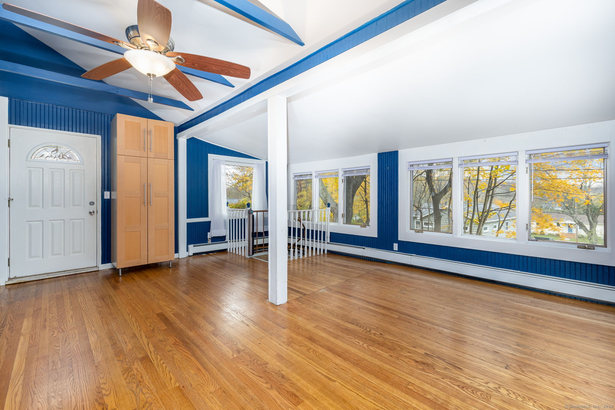 30 Lakeview Drive Bethlehem, CT 06751 - Photo 9 of 27 a view of empty room with wooden floor and fan