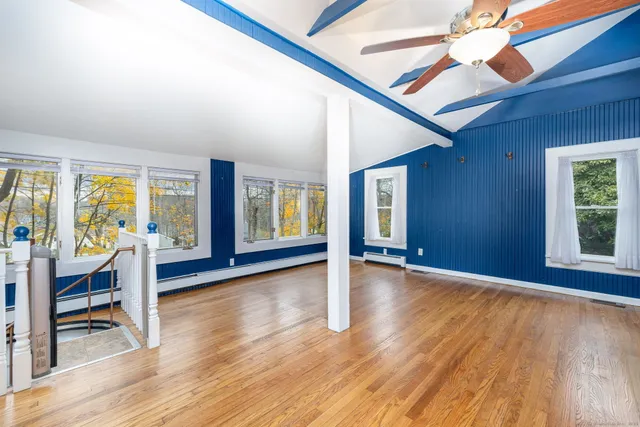 a view of livingroom with hardwood and furniture