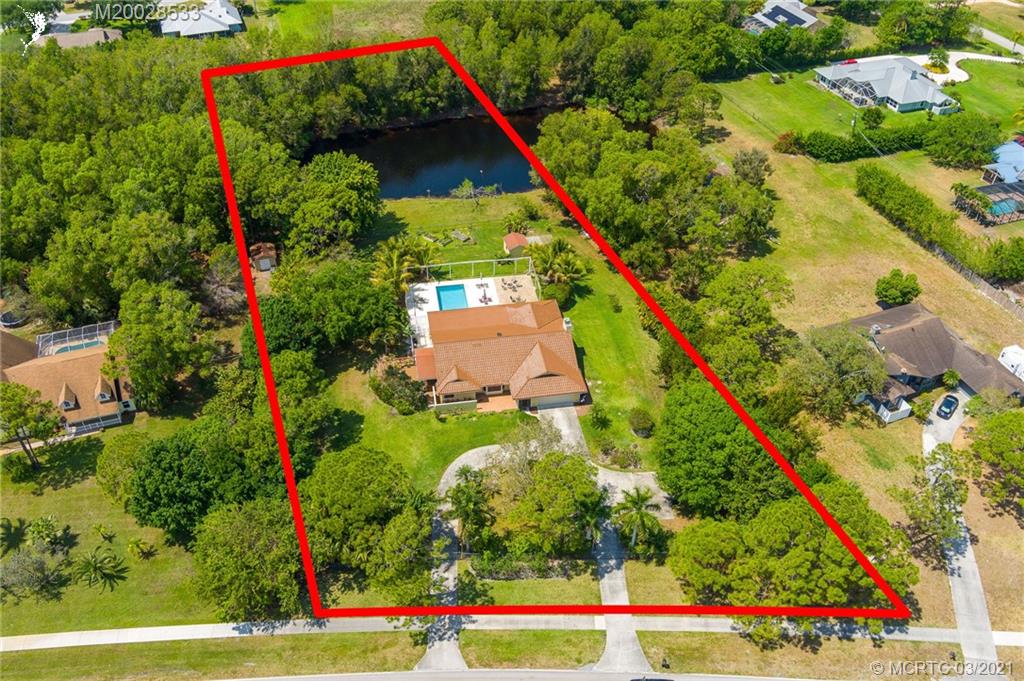 2850 Southwest Murphy Road Palm City, FL 34990 - Photo 2 of 27 an aerial view of a yard