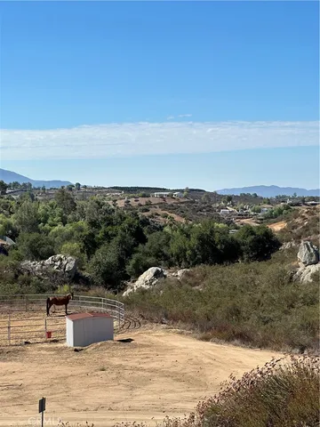 a view of a house with a mountain