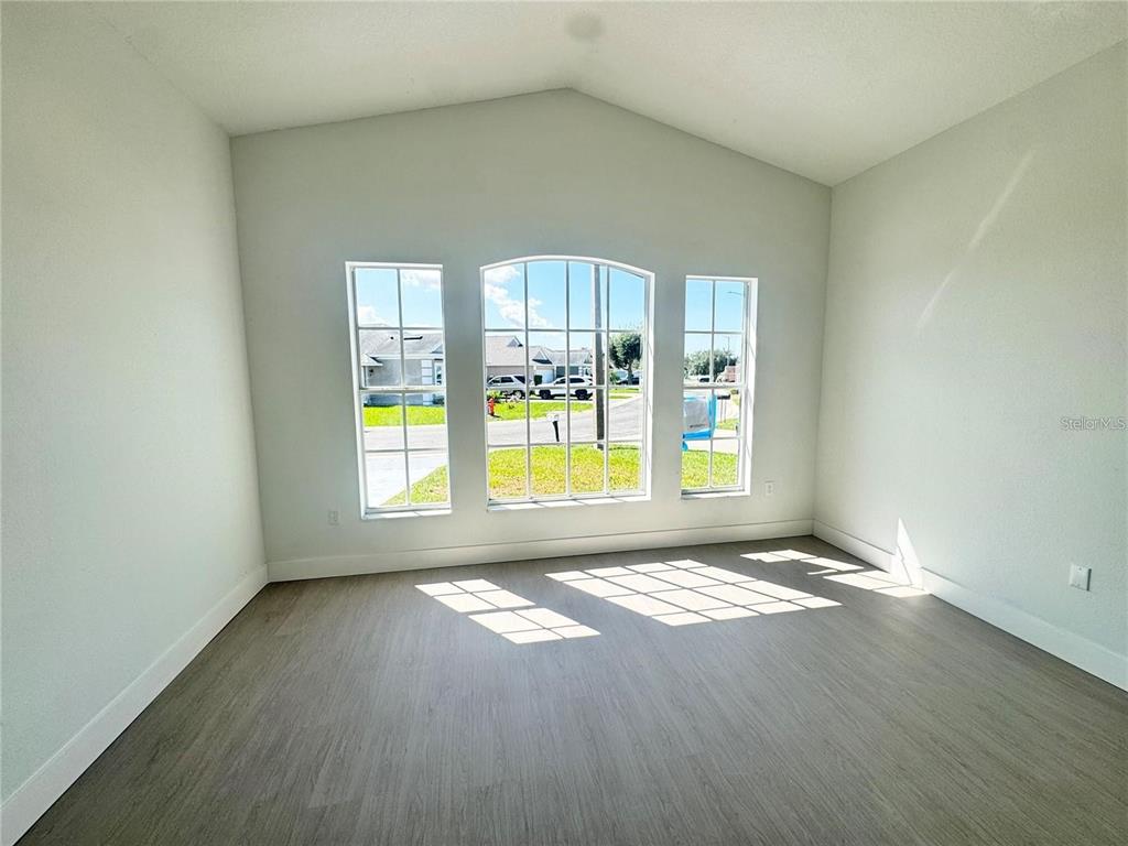 207 High Ridge Drive Davenport, FL 33837 - Photo 15 of 33 a view of an empty room with a window