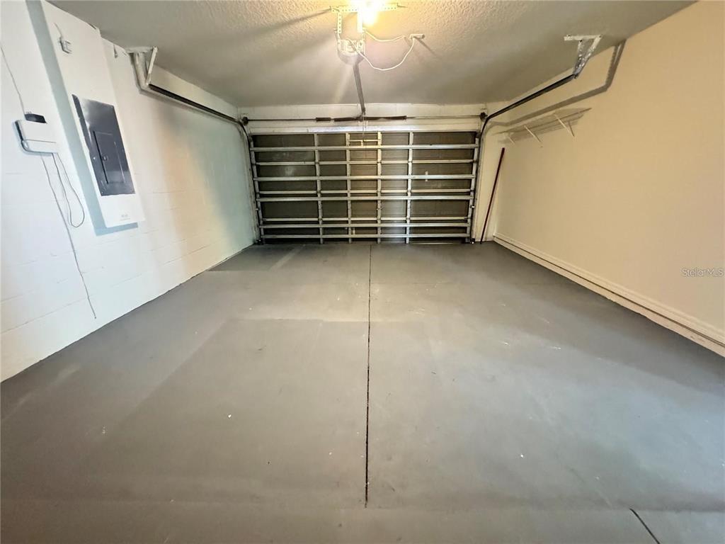 207 High Ridge Drive Davenport, FL 33837 - Photo 33 of 33 a view of a garage with stairs