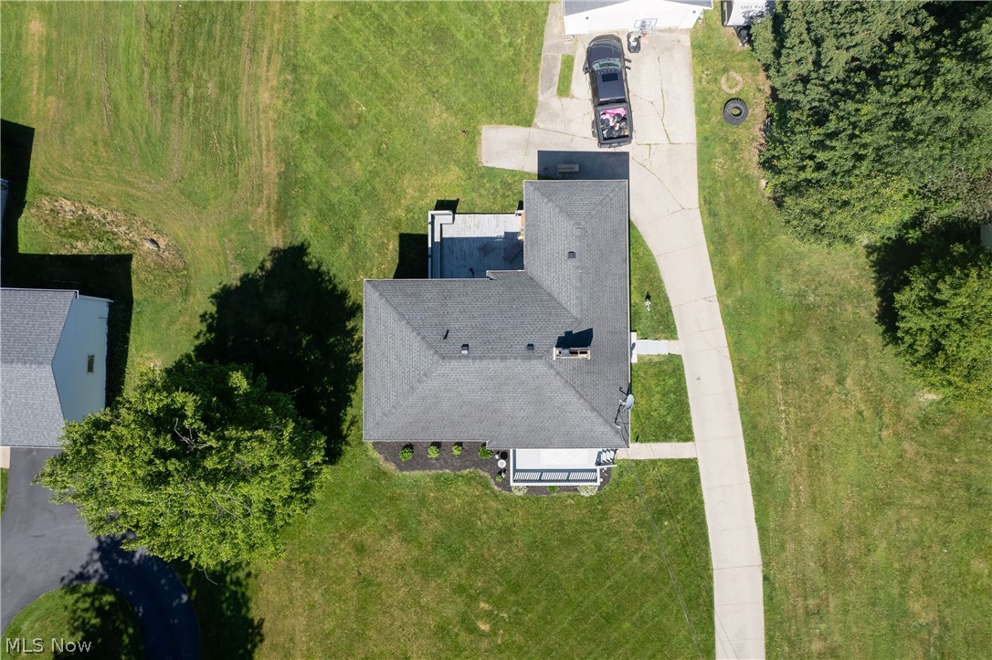 3659 Morrow Road Kent, OH 44240 - Photo 37 of 39 Aerial perspective highlighting the property's roofline, surrounding green space, and extensive paved driveway