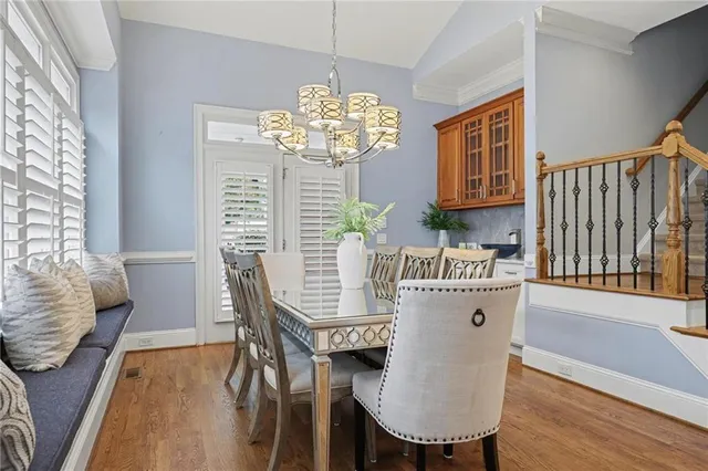 a bed room with a bed and a chair