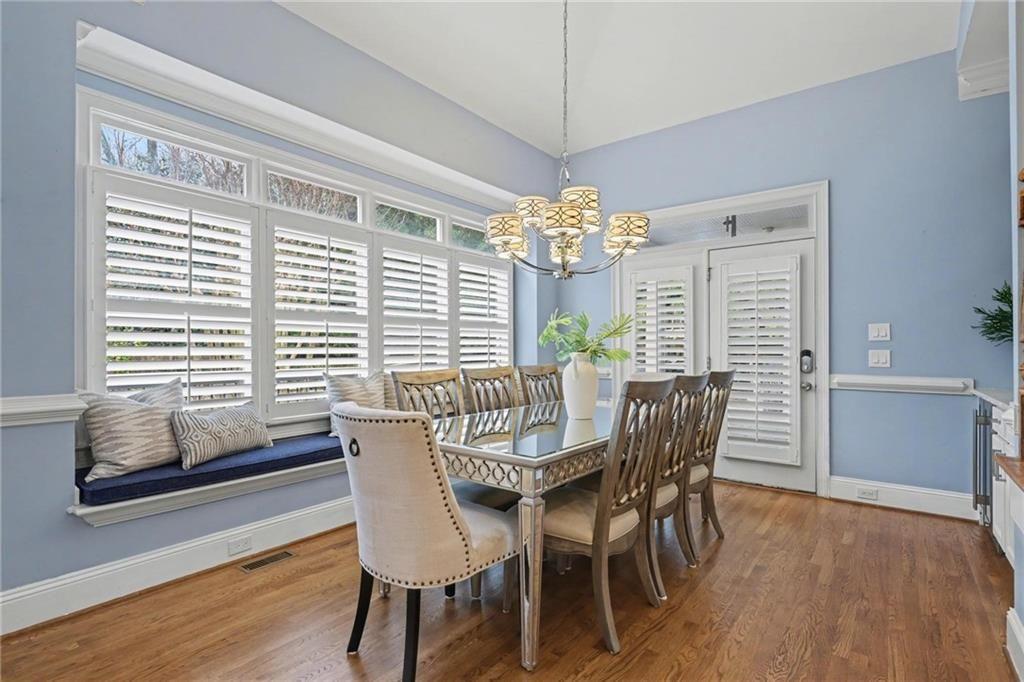 225 Farmbrooke Court Atlanta, GA 30350 - Photo 25 of 84 a view of a dining room with furniture window and wooden floor