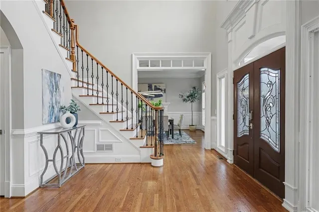 a kitchen with a sink cabinets and window