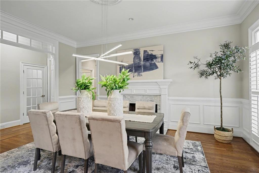 225 Farmbrooke Court Atlanta, GA 30350 - Photo 29 of 84 a dining room with furniture and wooden floor