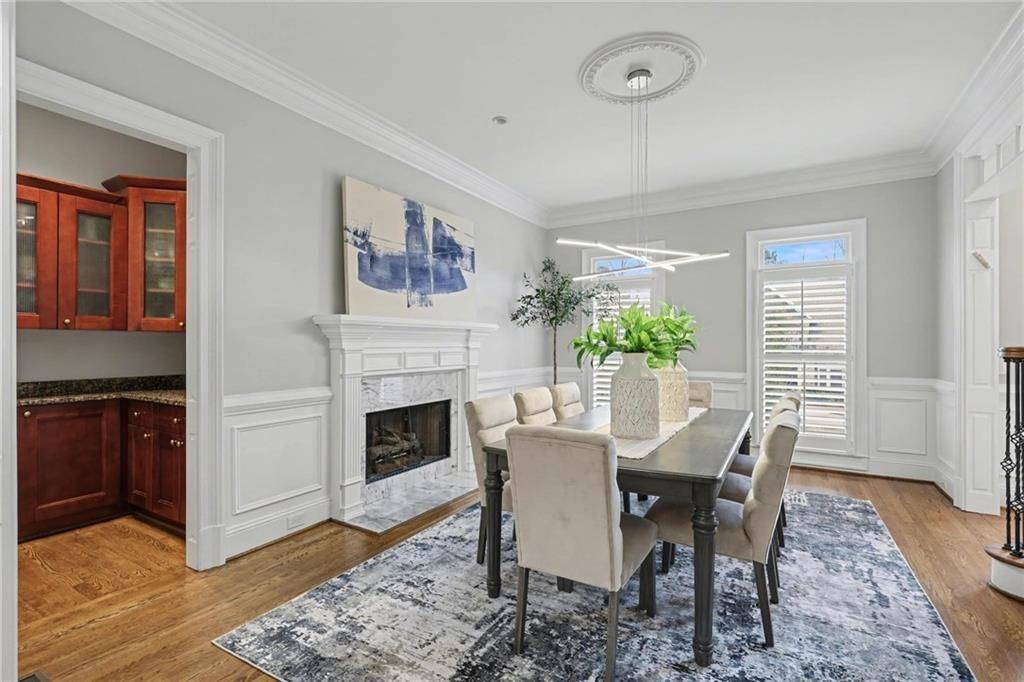 225 Farmbrooke Court Atlanta, GA 30350 - Photo 30 of 84 a view of a dining room with furniture window and wooden floor