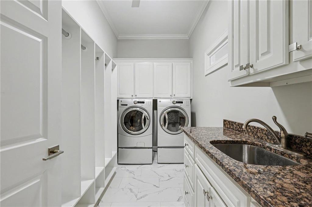 225 Farmbrooke Court Atlanta, GA 30350 - Photo 36 of 84 a utility room with sink dryer and washer