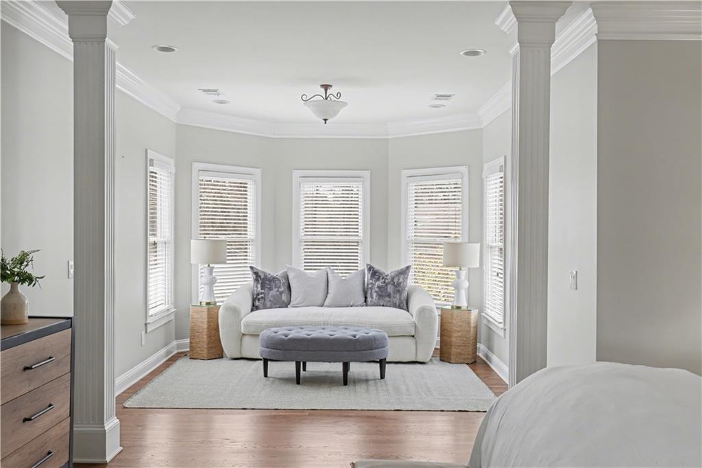 225 Farmbrooke Court Atlanta, GA 30350 - Photo 45 of 84 a living room with furniture and a potted plant