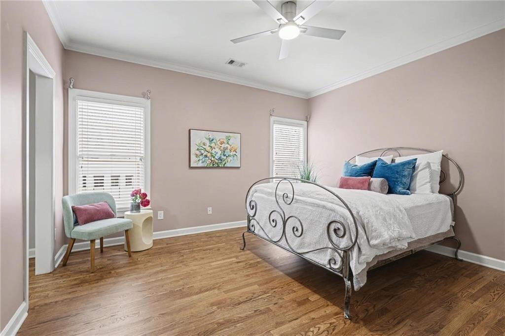 225 Farmbrooke Court Atlanta, GA 30350 - Photo 58 of 84 a bedroom with a bed and a window