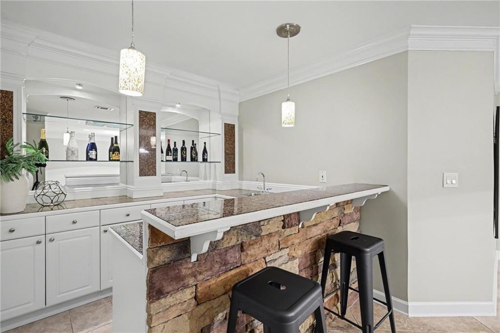 225 Farmbrooke Court Atlanta, GA 30350 - Photo 63 of 84 a kitchen with a sink cabinets and window