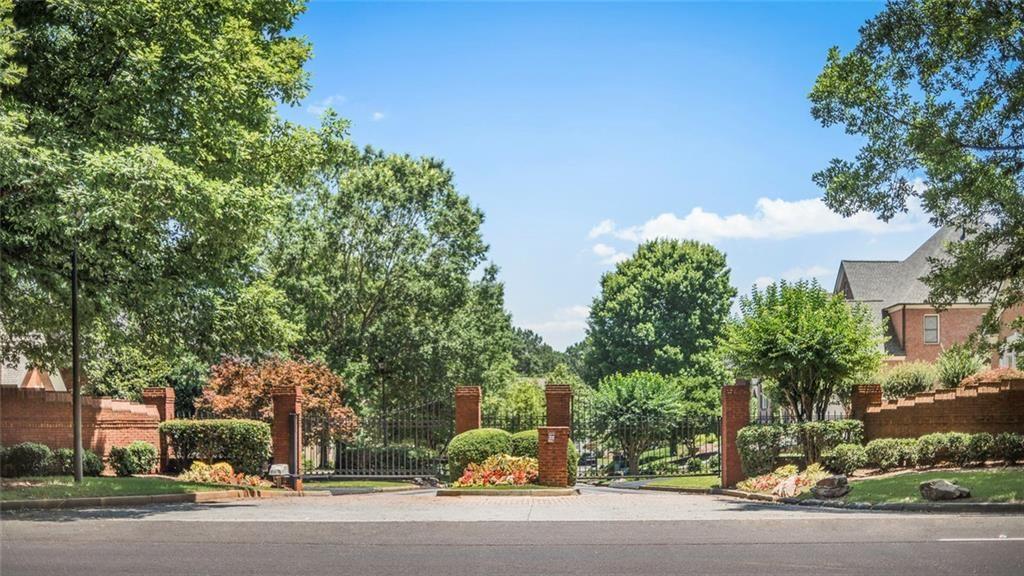 225 Farmbrooke Court Atlanta, GA 30350 - Photo 81 of 84 a couple of cars parked in front of a house