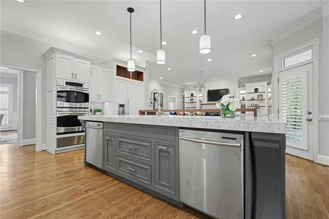 a living room with furniture fireplace and flat screen tv