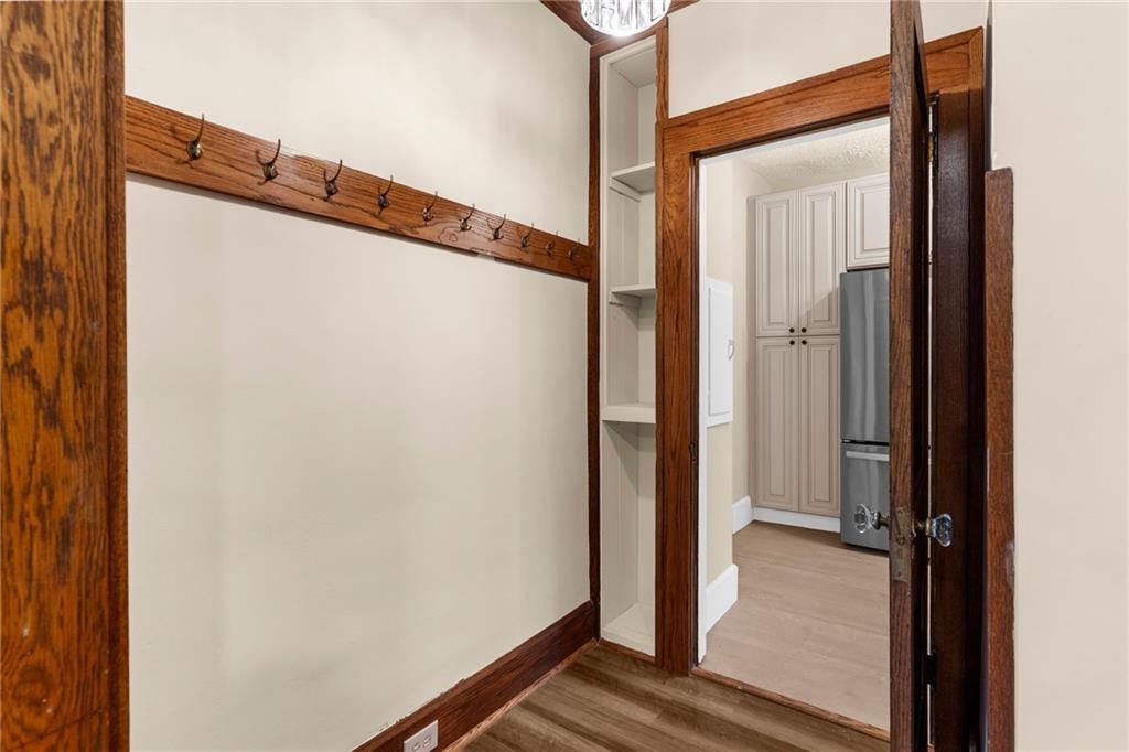 895 Alcoma Street Sharon, PA 16146 - Photo 21 of 41 a view of walk in closet with wooden floor