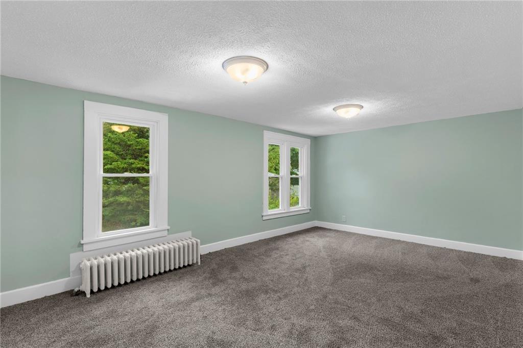 895 Alcoma Street Sharon, PA 16146 - Photo 23 of 41 an empty room with a window
