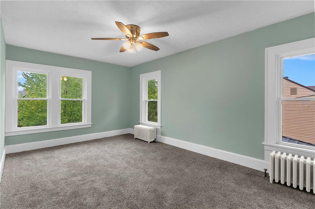 895 Alcoma Street Sharon, PA 16146 - Photo 28 of 41 a view of an empty room with a window