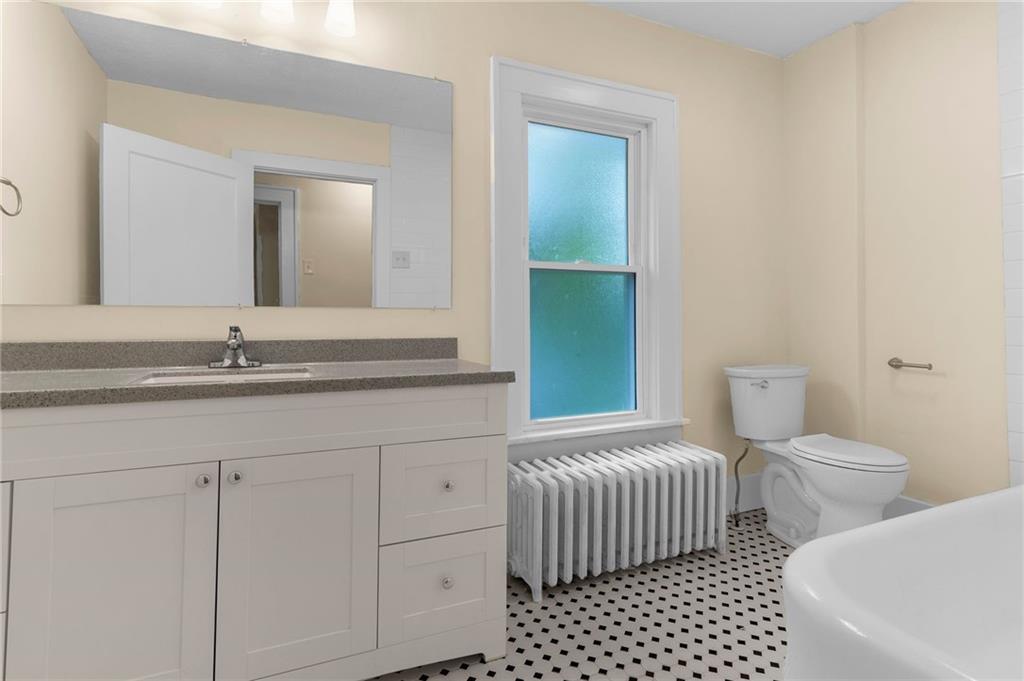 895 Alcoma Street Sharon, PA 16146 - Photo 30 of 41 a bathroom with a sink and a toilet