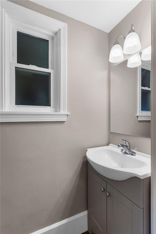 895 Alcoma Street Sharon, PA 16146 - Photo 32 of 41 a bathroom with a sink and a mirror