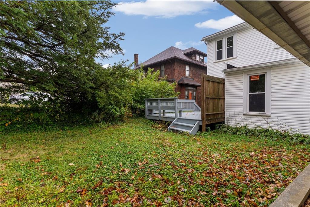 895 Alcoma Street Sharon, PA 16146 - Photo 34 of 41 a backyard of a house with table and chairs