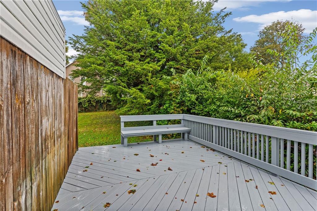 895 Alcoma Street Sharon, PA 16146 - Photo 36 of 41 a view of a backyard with wooden fence