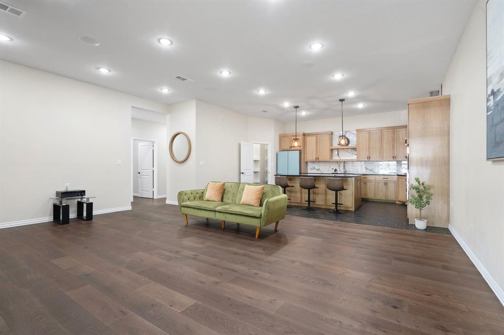 2514 Carpenter Avenue Dallas, TX 75215 - Photo 5 of 24 a living room with furniture and kitchen view