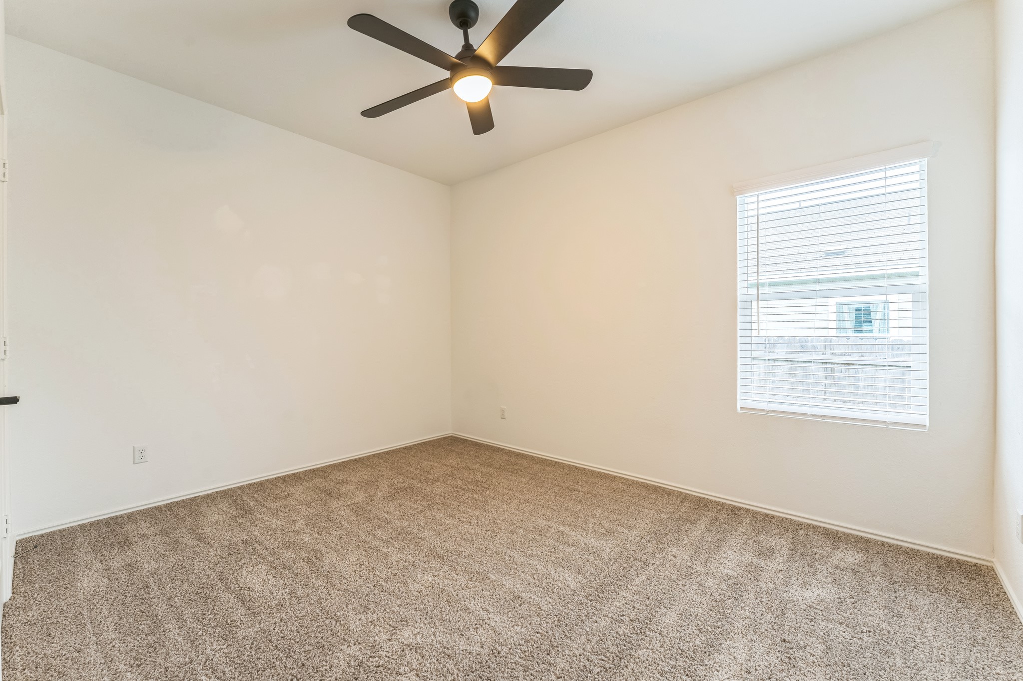 108 Fighting Seabees Run Jarrell, TX 76537 - Photo 13 of 19 an empty room with a window and a fan
