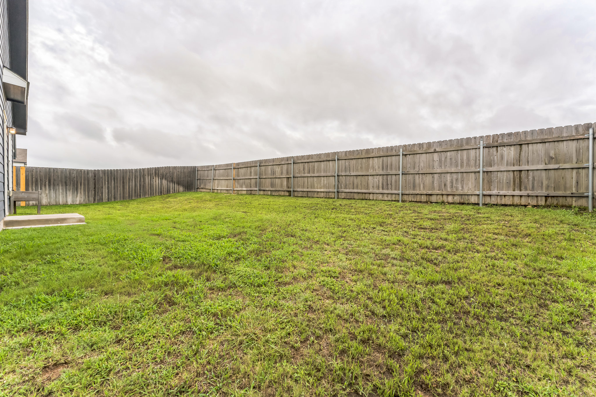 108 Fighting Seabees Run Jarrell, TX 76537 - Photo 18 of 19 a view of a yard with wooden fence
