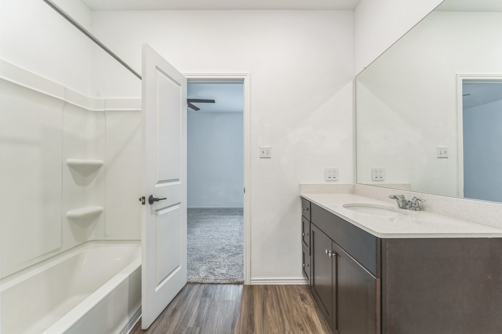 108 Fighting Seabees Run Jarrell, TX 76537 - Photo 8 of 19 a bathroom with a sink and a bathtub