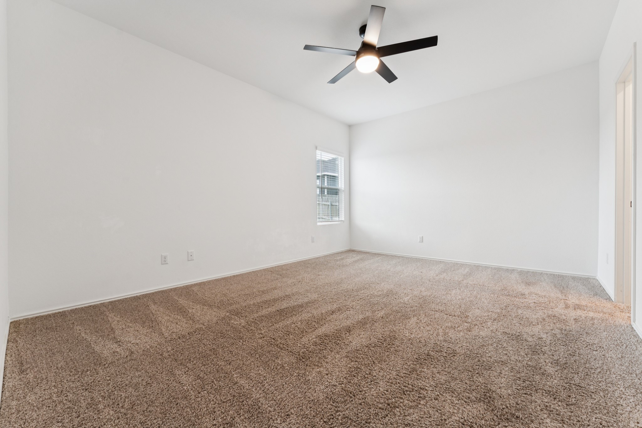 108 Fighting Seabees Run Jarrell, TX 76537 - Photo 10 of 19 a view of a big room with carpet