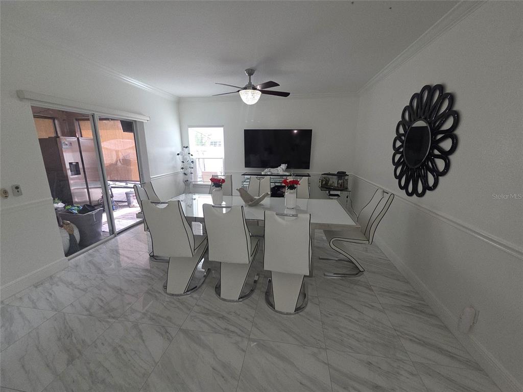 4162 Day Bridge Place Ellenton, FL 34222 - Photo 20 of 49 a view of a dining room with furniture window and wooden floor