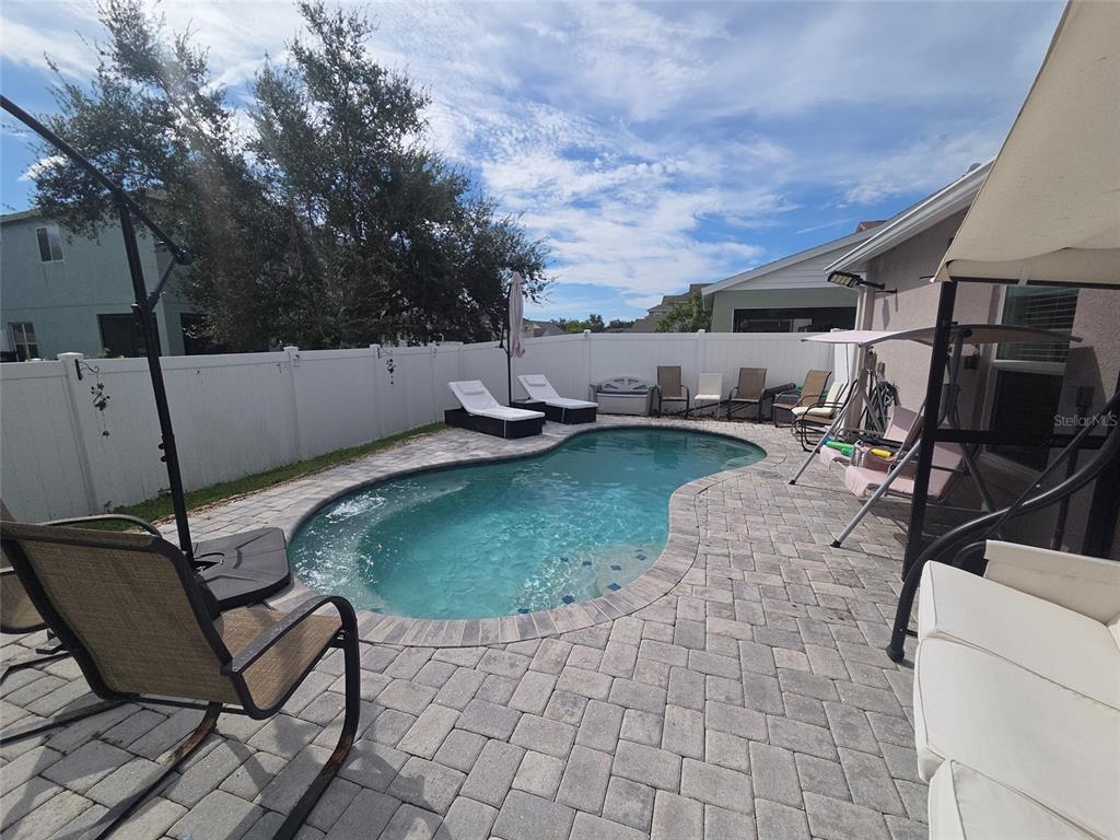 4162 Day Bridge Place Ellenton, FL 34222 - Photo 4 of 49 a view of a backyard with sitting area