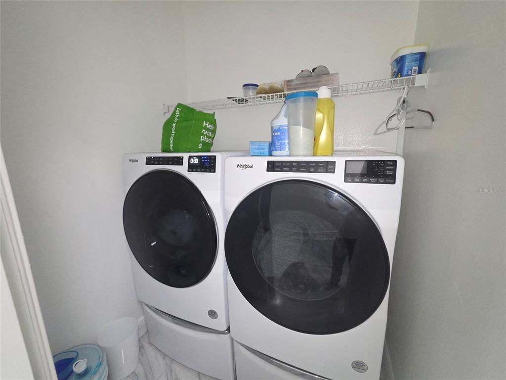 4162 Day Bridge Place Ellenton, FL 34222 - Photo 46 of 49 a utility room with dryer and washer