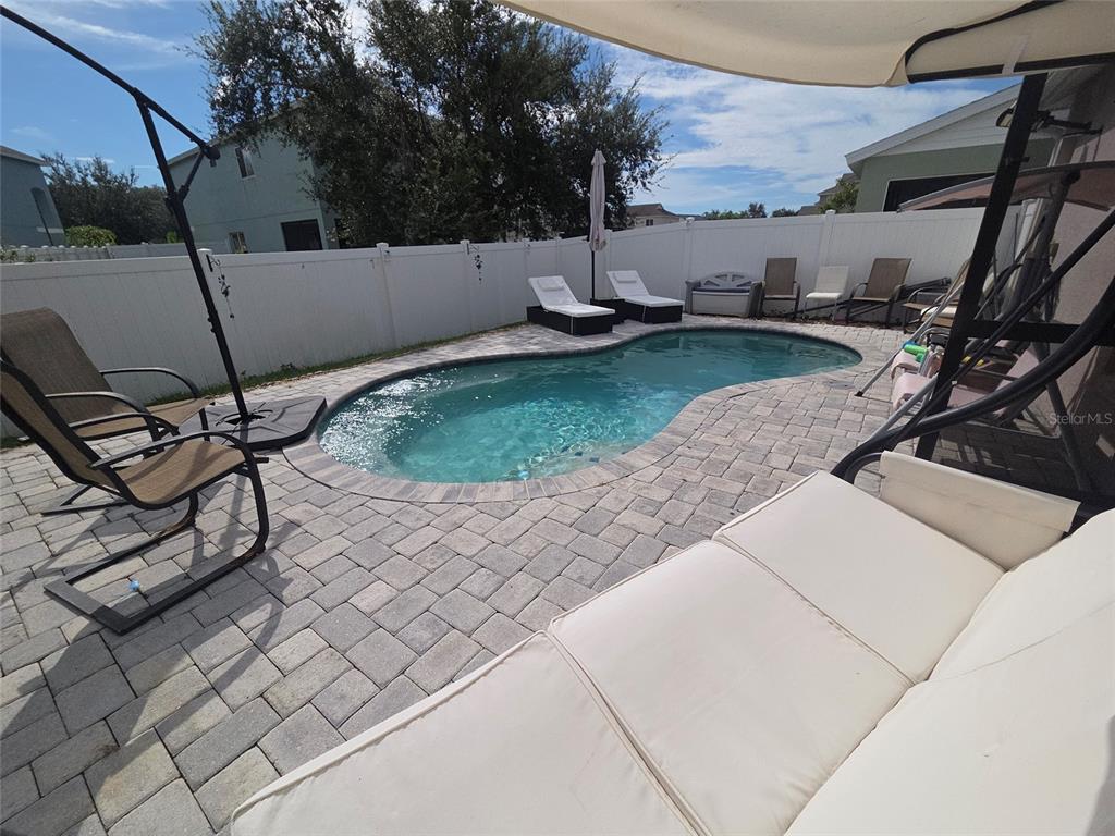 4162 Day Bridge Place Ellenton, FL 34222 - Photo 5 of 49 a view of a backyard with sitting area