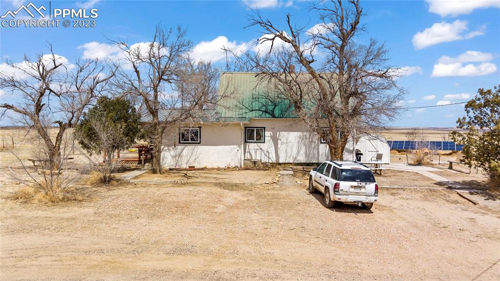 2905 Lauppe Road Yoder, CO 80864 - Photo 34 of 35 a view of a house with a yard covered in snow